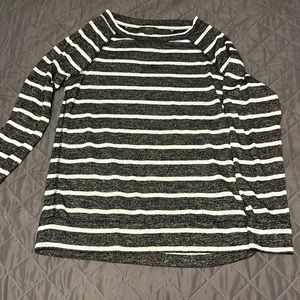 Black and white striped 3/4 length top.
